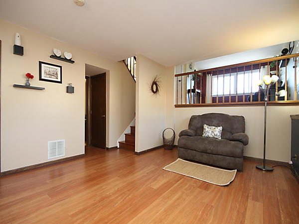 S031 Leonard Street Winfield, IL 60190 - Photo 18 of 25 a living room with furniture and a window