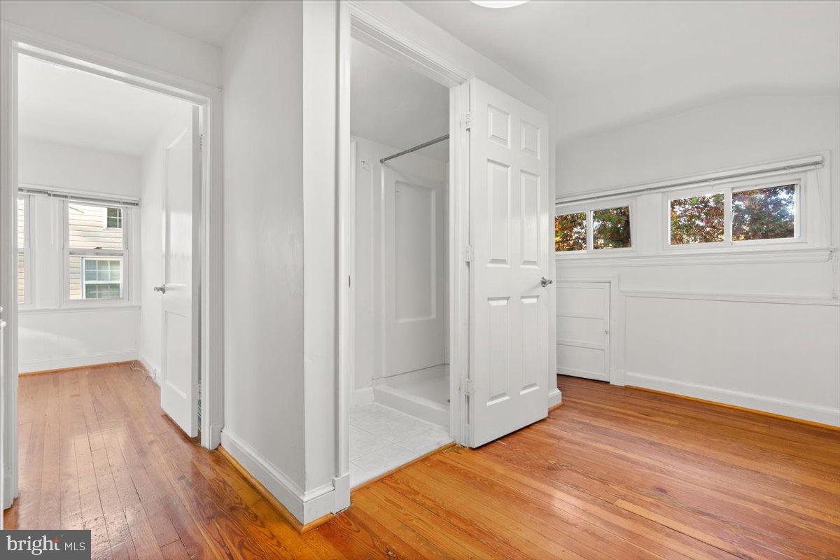 4302 30th Street Mount Rainier, MD 20712 - Photo 14 of 23 a view of a room with wooden floor and hallway