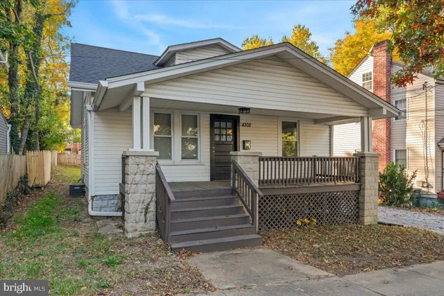 a front view of a house with a porch