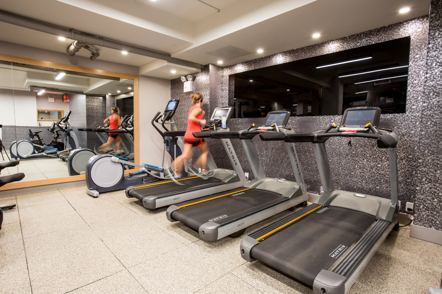 345 East 94th Street, Unit 6B Manhattan, NY 10128 - Photo 18 of 18 a view of a room with gym equipment
