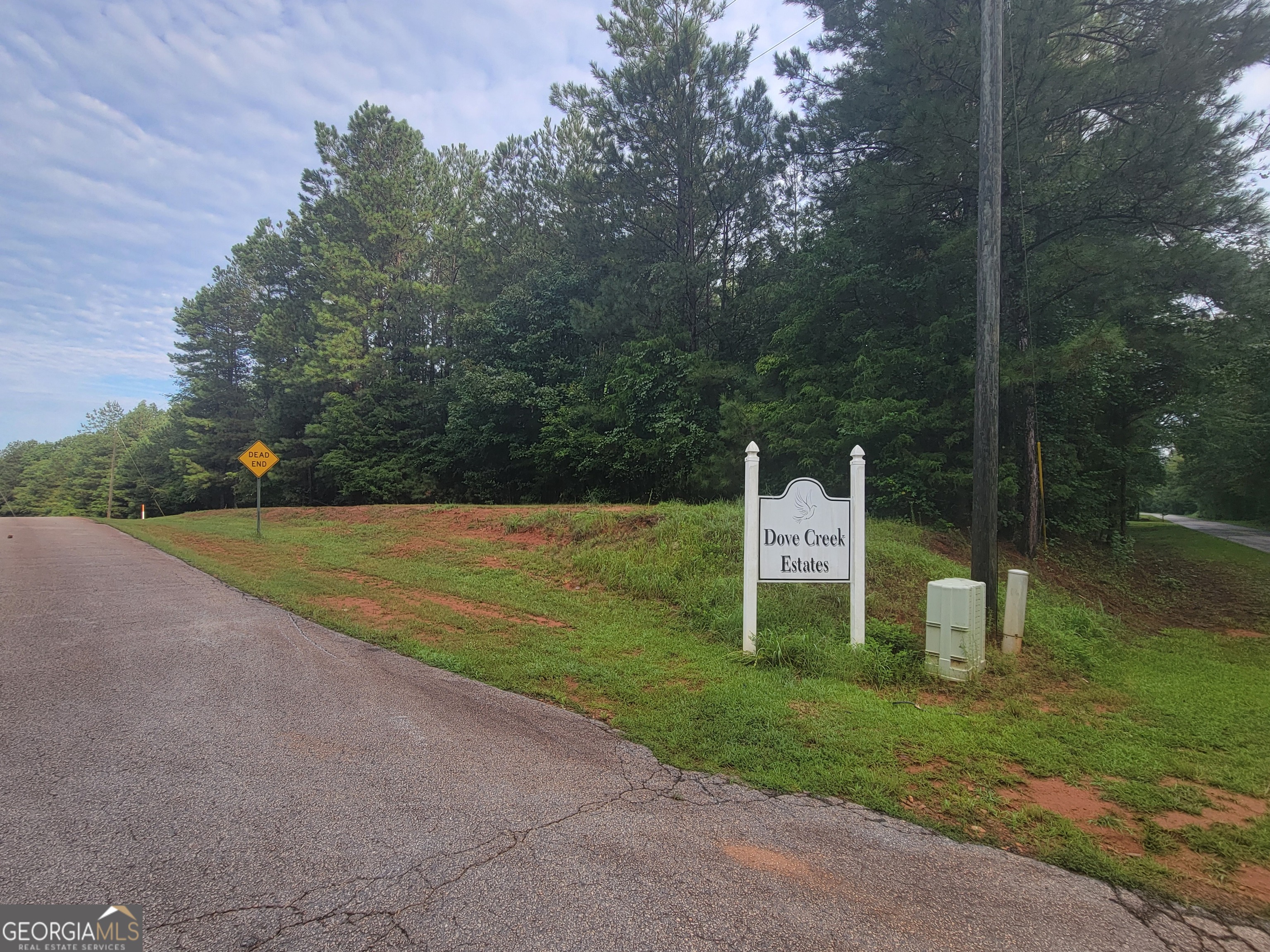 a sign that is on the side of the road