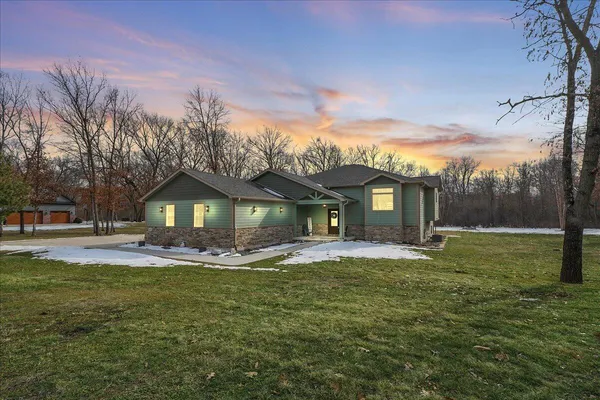 a view of a house with a yard