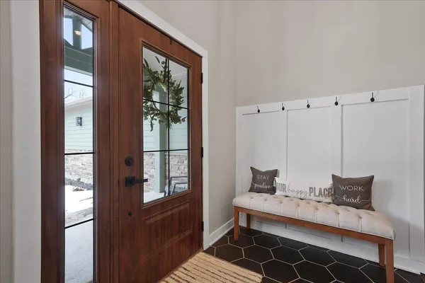 a room that has a bed and a window in it