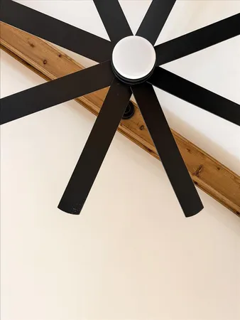 a view of en suite bathroom with a sink and a mirror