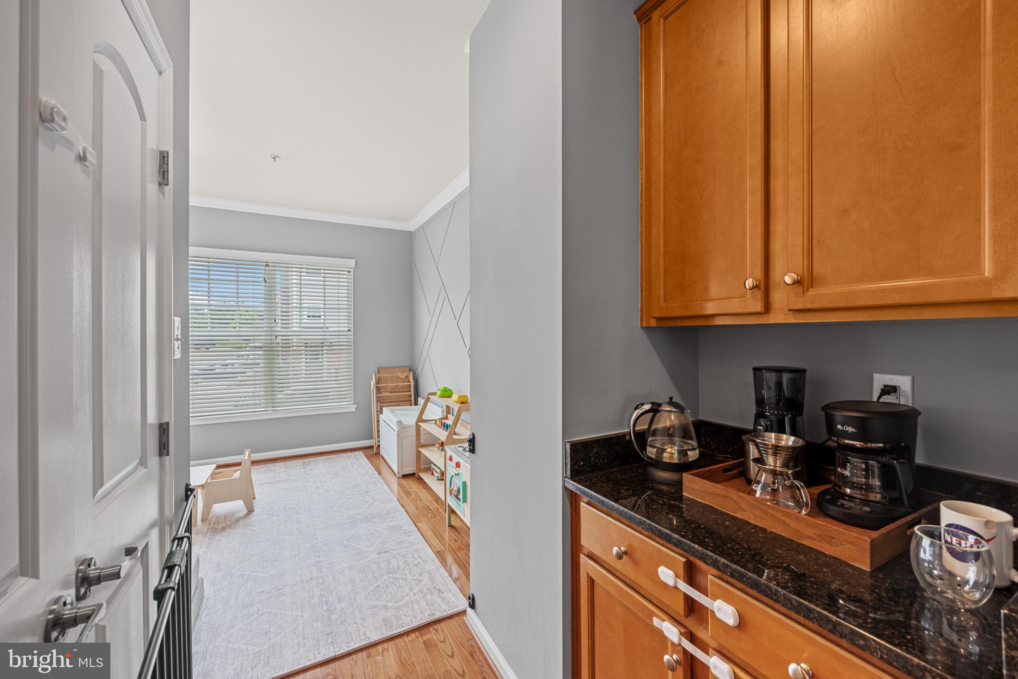 7907 Silver Oak Road Hanover, MD 21076 - Photo 5 of 26 Coffee bar leads to Living room
