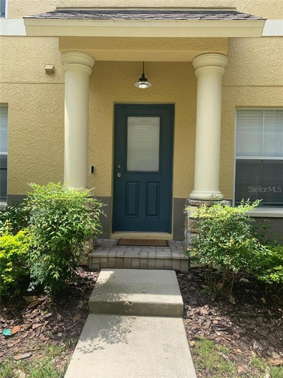 217 Drawbridge Lane Valrico, FL 33594 - Photo 1 of 1 a front view of a house with a yard