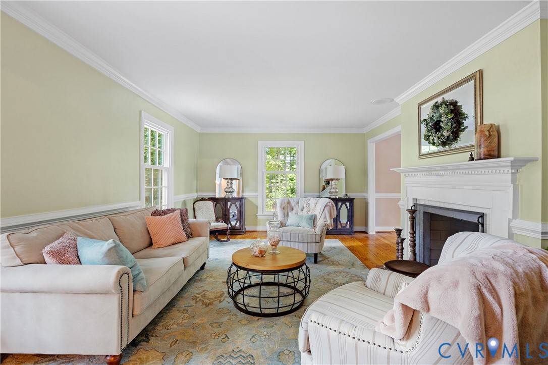 1911 Oakengate Lane Midlothian, VA 23113 - Photo 20 of 47 a living room with furniture and a fireplace