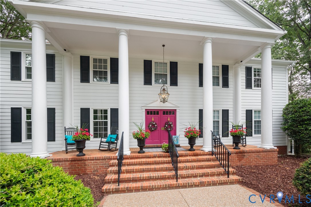 1911 Oakengate Lane Midlothian, VA 23113 - Photo 2 of 47 a view of building with street sign on the road