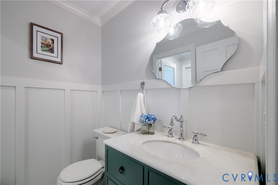 1911 Oakengate Lane Midlothian, VA 23113 - Photo 22 of 47 a bathroom with a sink vanity and toilet