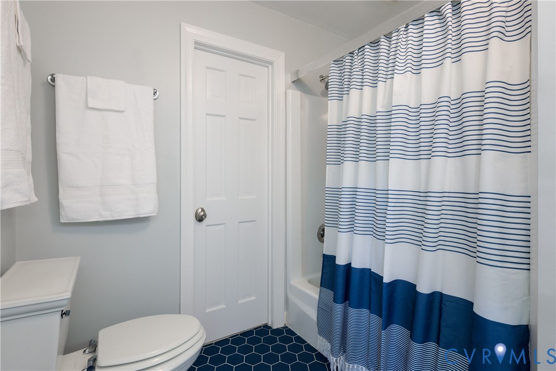 1911 Oakengate Lane Midlothian, VA 23113 - Photo 34 of 47 a bathroom with a sink toilet and shower
