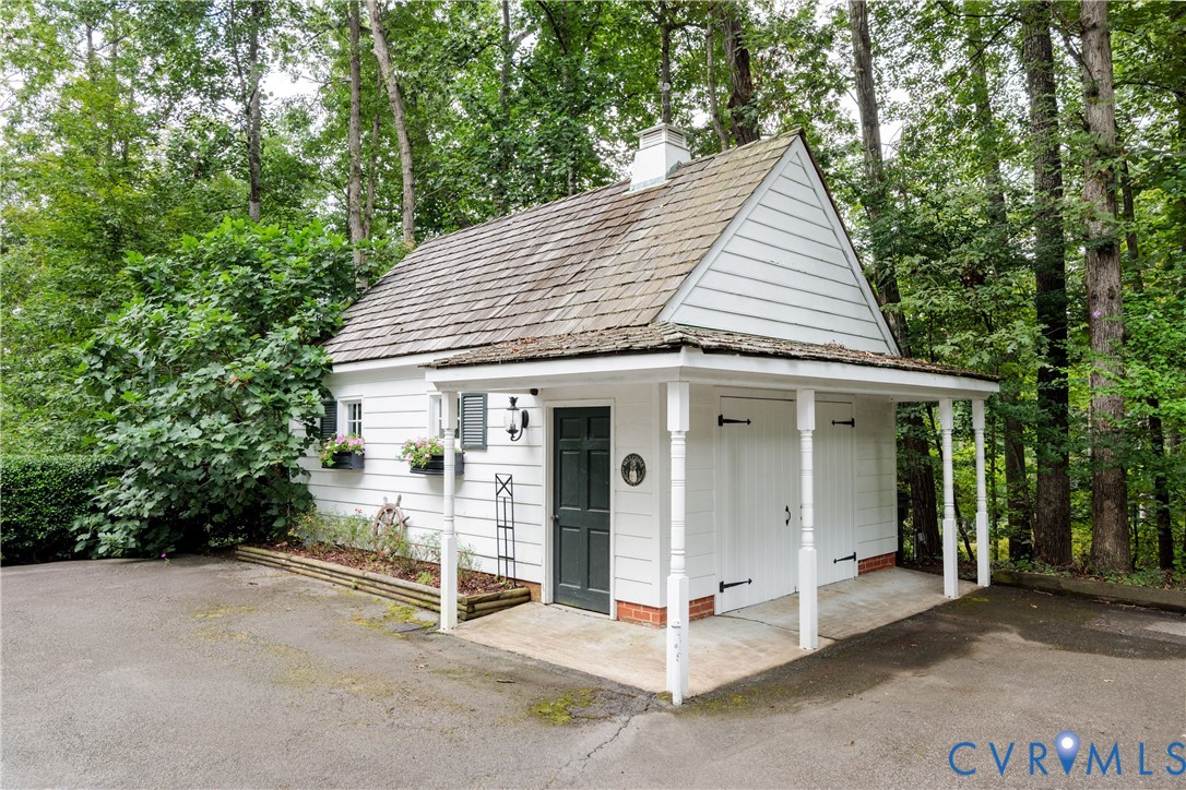 1911 Oakengate Lane Midlothian, VA 23113 - Photo 43 of 47 a view of a house with a balcony and floor to ceiling window
