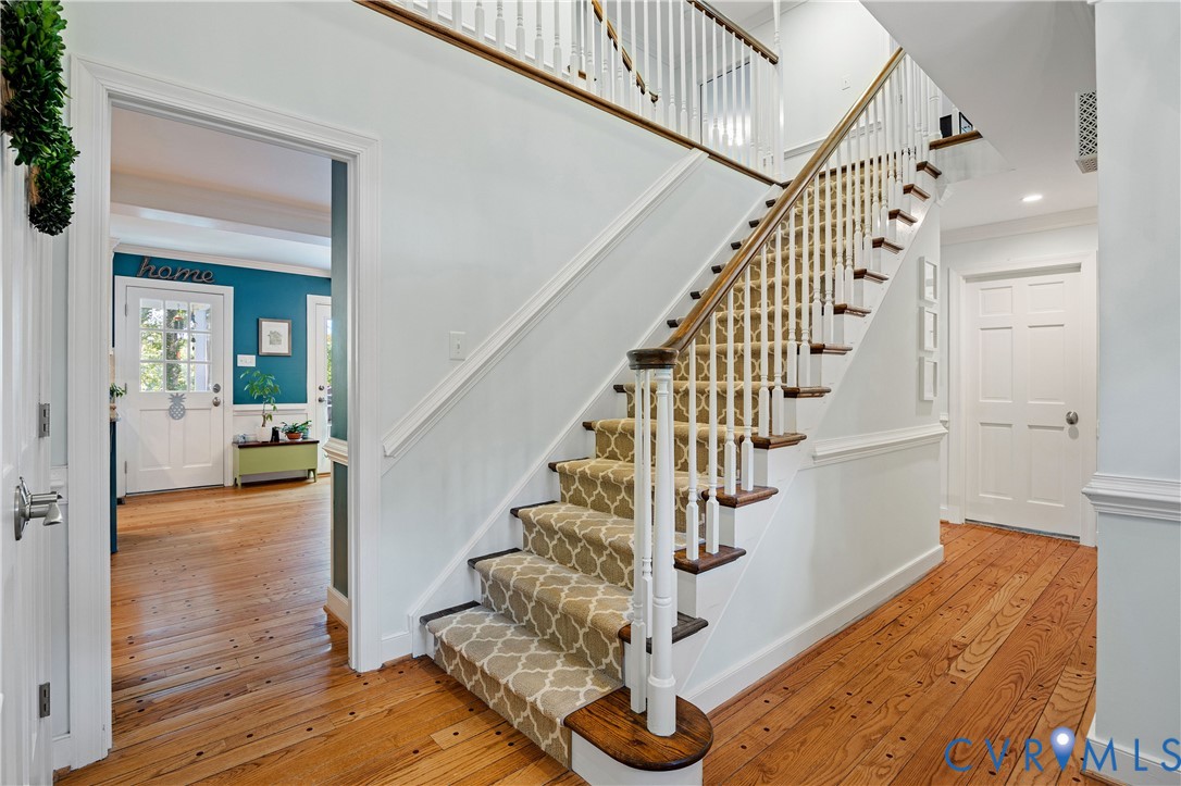 1911 Oakengate Lane Midlothian, VA 23113 - Photo 7 of 47 a view of entryway and hall with wooden floor