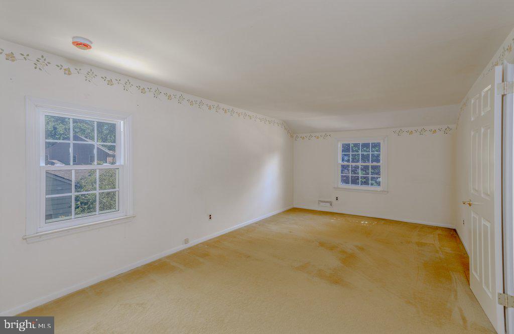 324 Wayland Road Cherry Hill, NJ 08034 - Photo 18 of 28 an empty room with windows