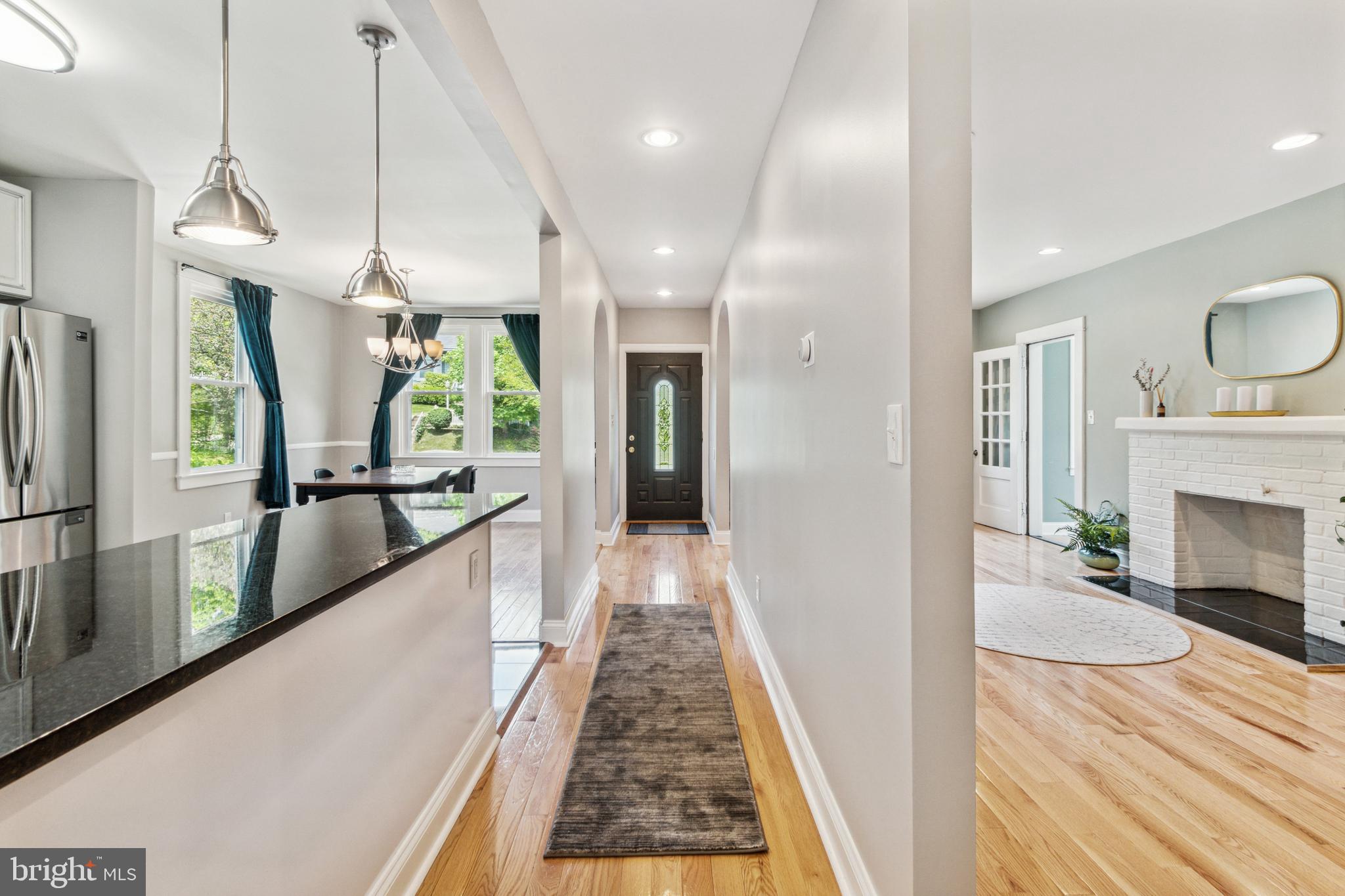 911 Regester Avenue Baltimore, MD 21239 - Photo 12 of 40 View from kitchen to front door