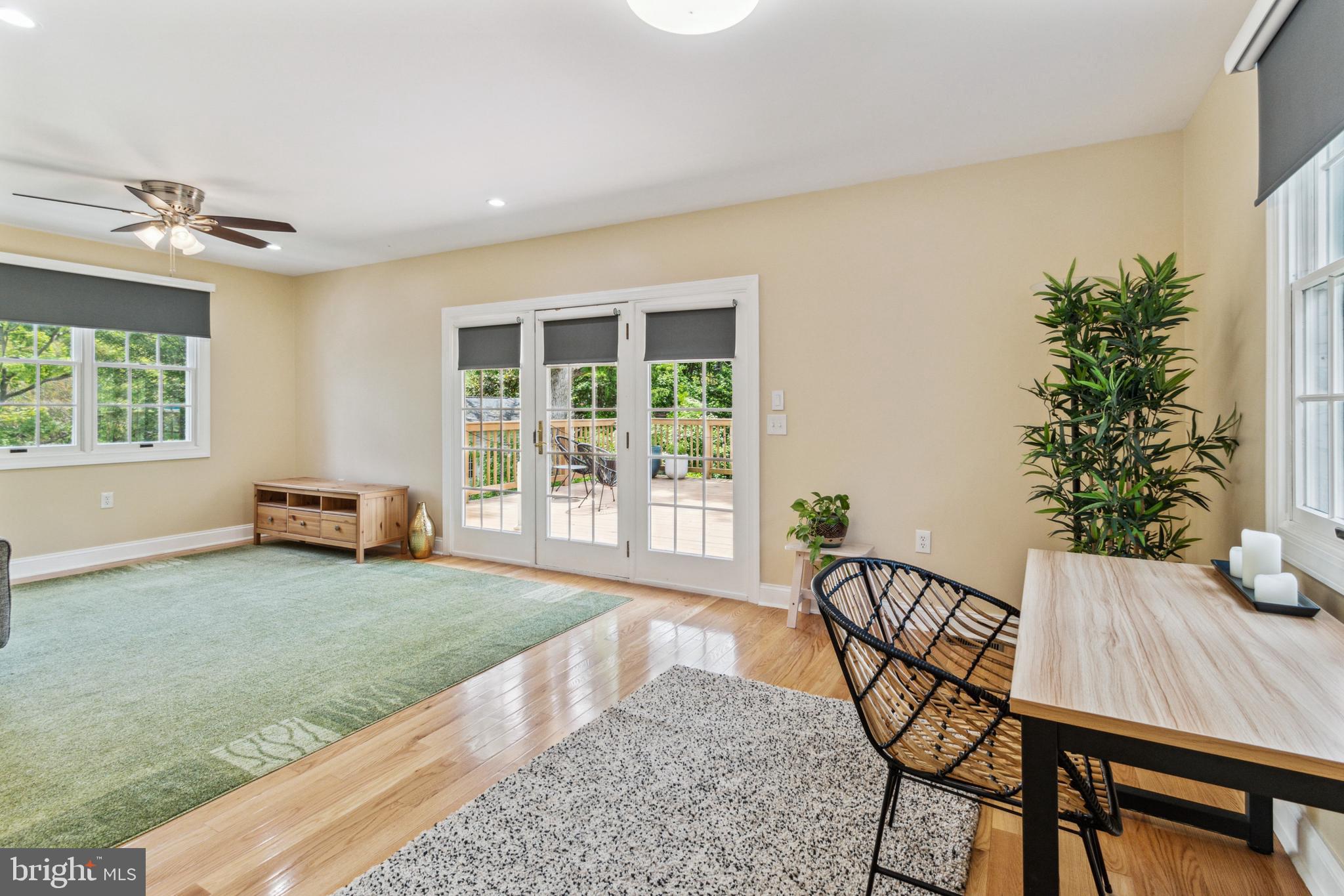 911 Regester Avenue Baltimore, MD 21239 - Photo 14 of 40 Family room with great view of the large deck