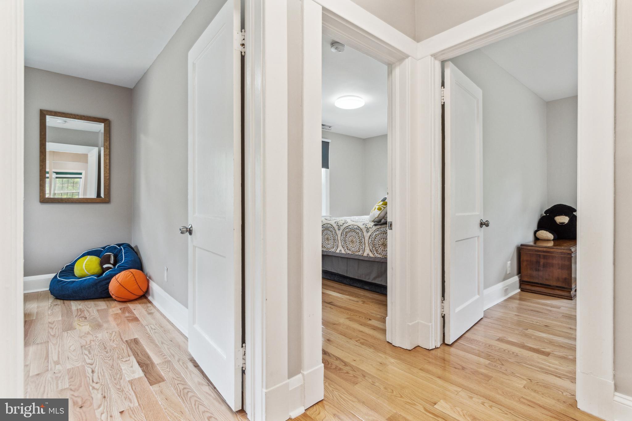 911 Regester Avenue Baltimore, MD 21239 - Photo 19 of 40 Hall view into 3 bedrooms.