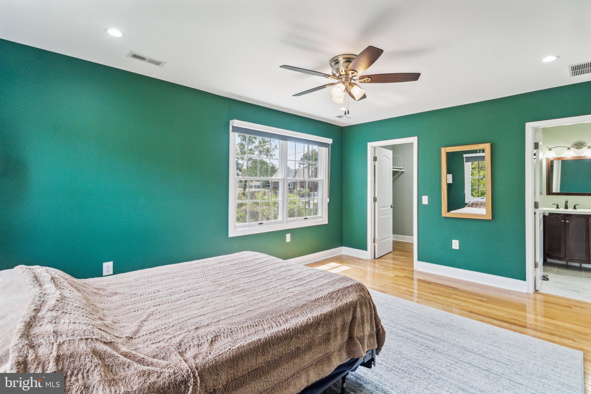 911 Regester Avenue Baltimore, MD 21239 - Photo 25 of 40 Primary bedroom with view to walk in closet