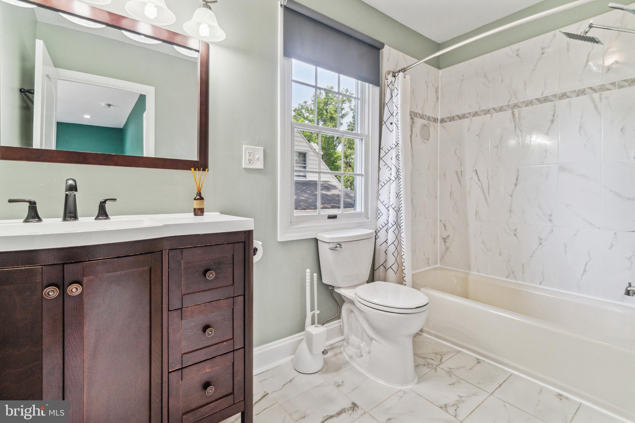 911 Regester Avenue Baltimore, MD 21239 - Photo 27 of 40 Primary ensuite bathroom