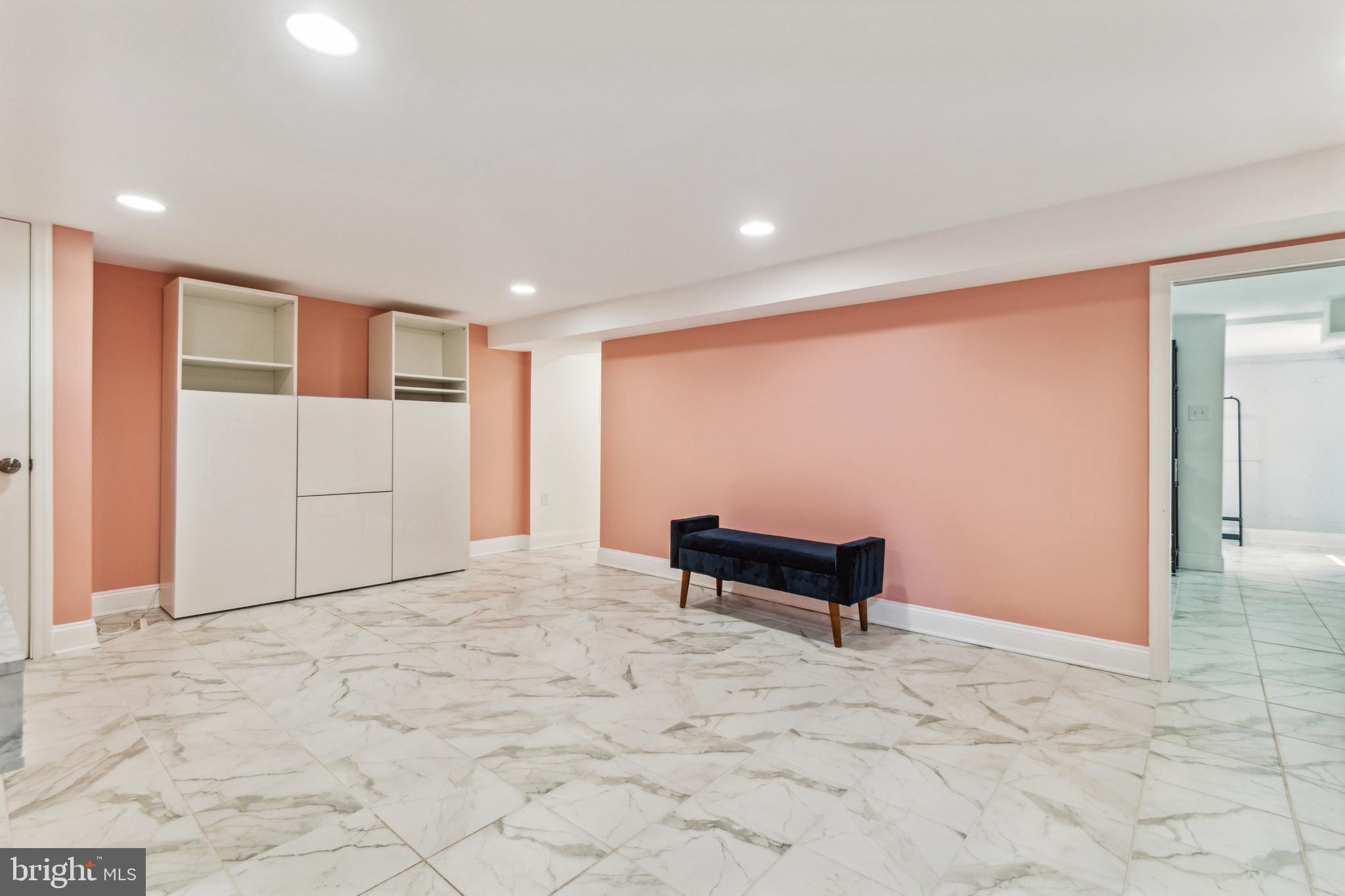 911 Regester Avenue Baltimore, MD 21239 - Photo 29 of 40 Large family room in basement