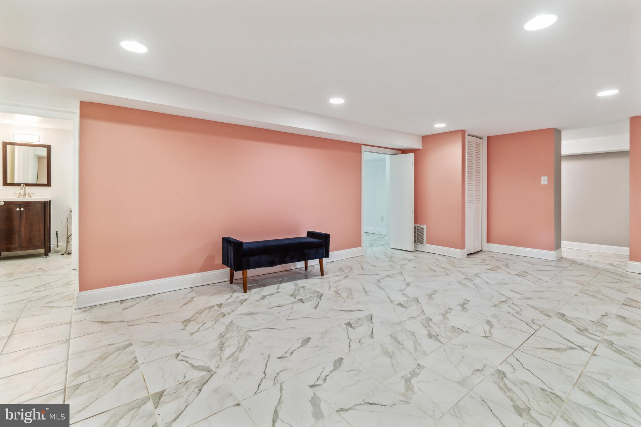 911 Regester Avenue Baltimore, MD 21239 - Photo 30 of 40 Basement family room