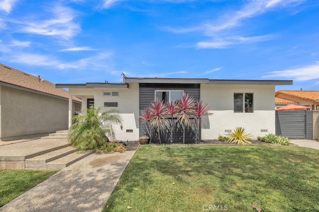 a front view of house with yard