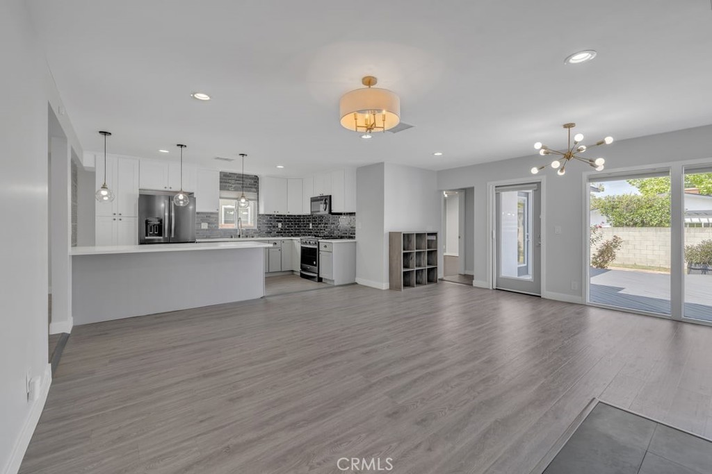 2909 Nipomo Avenue Long Beach, CA 90815 - Photo 11 of 41 a view of a kitchen with a sink and a large window
