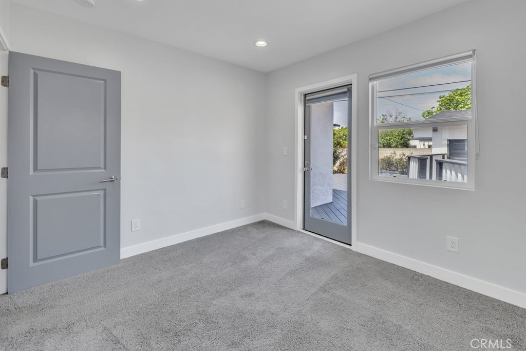 2909 Nipomo Avenue Long Beach, CA 90815 - Photo 34 of 41 a view of an empty room and a gallery