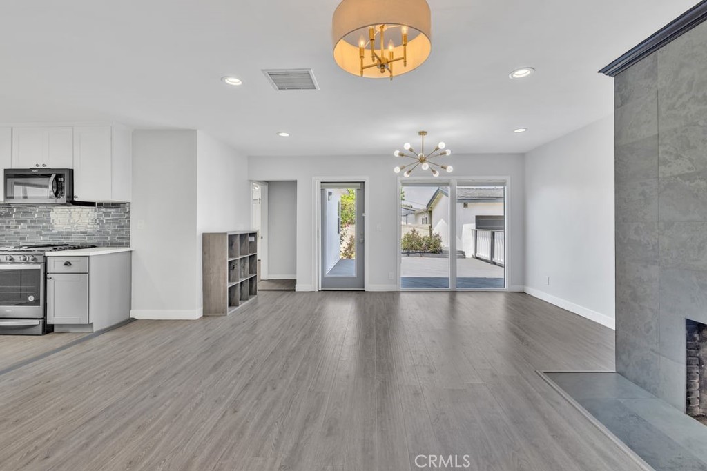 2909 Nipomo Avenue Long Beach, CA 90815 - Photo 10 of 41 a view of a kitchen with a sink and a large window