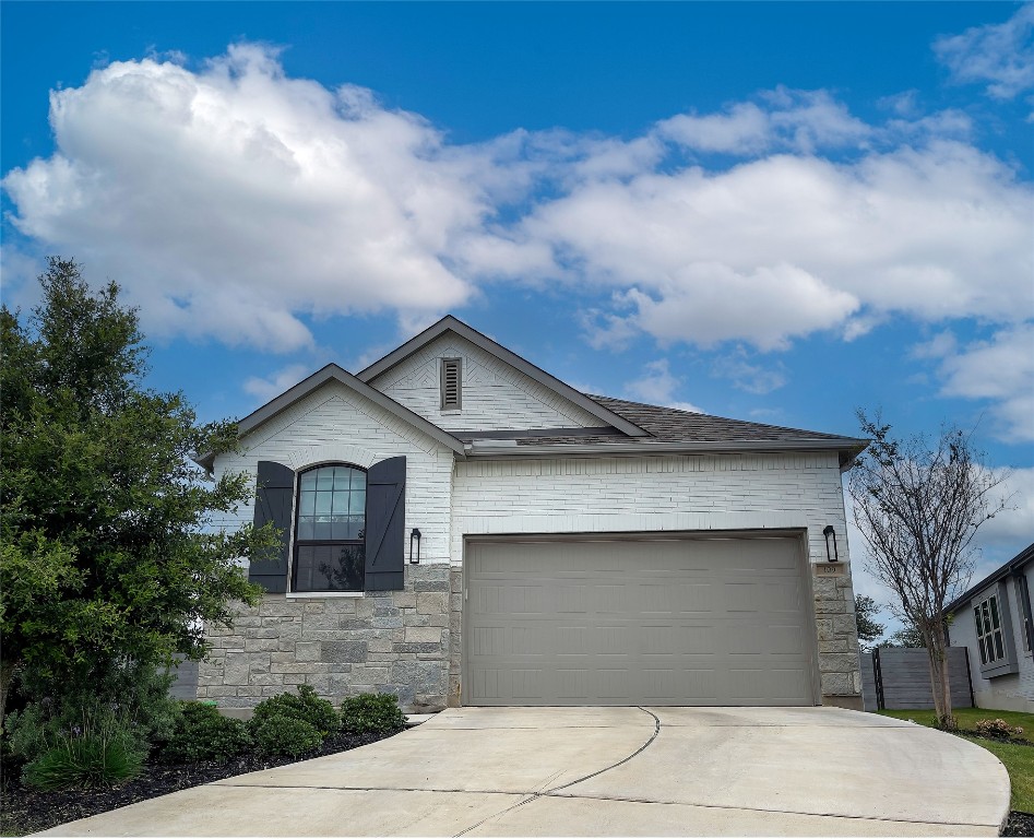 109 Arrowhead Mound Road Georgetown, TX 78628 - Photo 1 of 1 a front view of a house with garage
