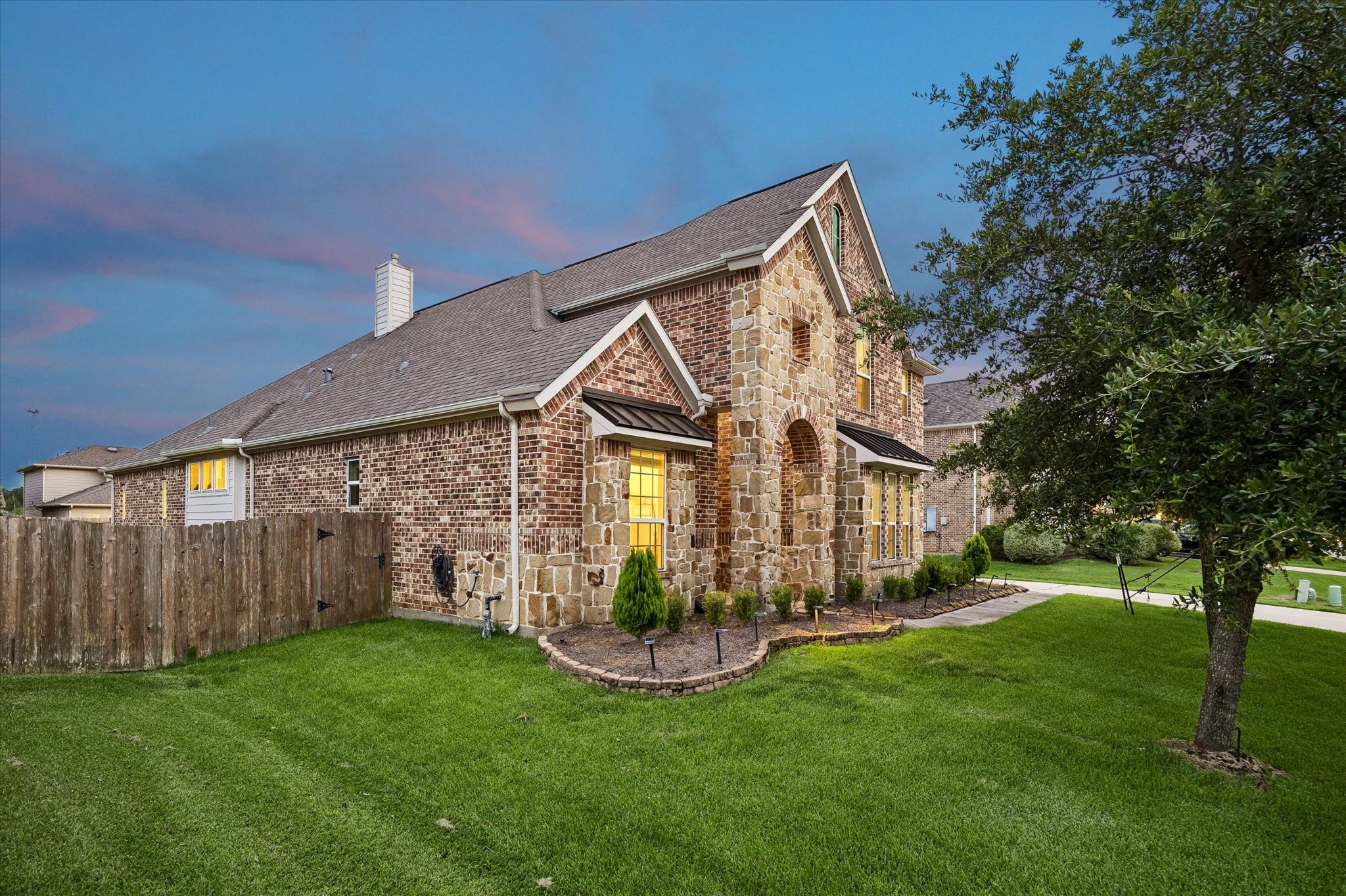 3306 Explorer Way Conroe, TX 77301 - Photo 3 of 35 Brick all around, and stone elevation.