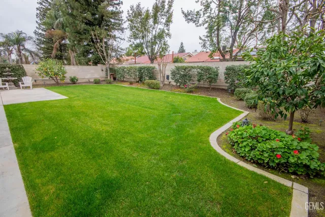 a view of a garden with a fountain