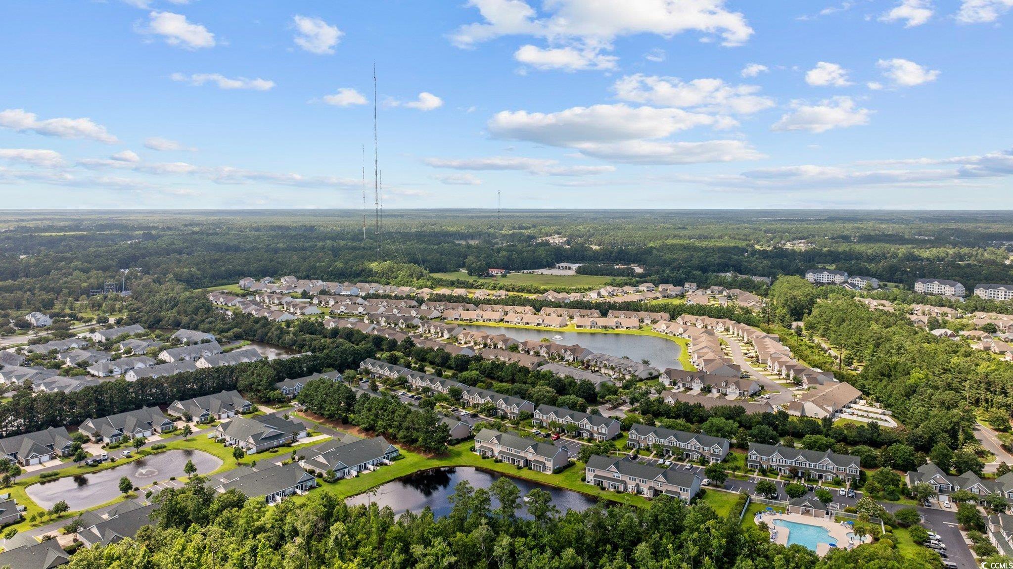155 Chenoa Drive, Unit D Murrells Inlet, SC 29576 - Photo 25 of 33 Rear view of property with a patio area