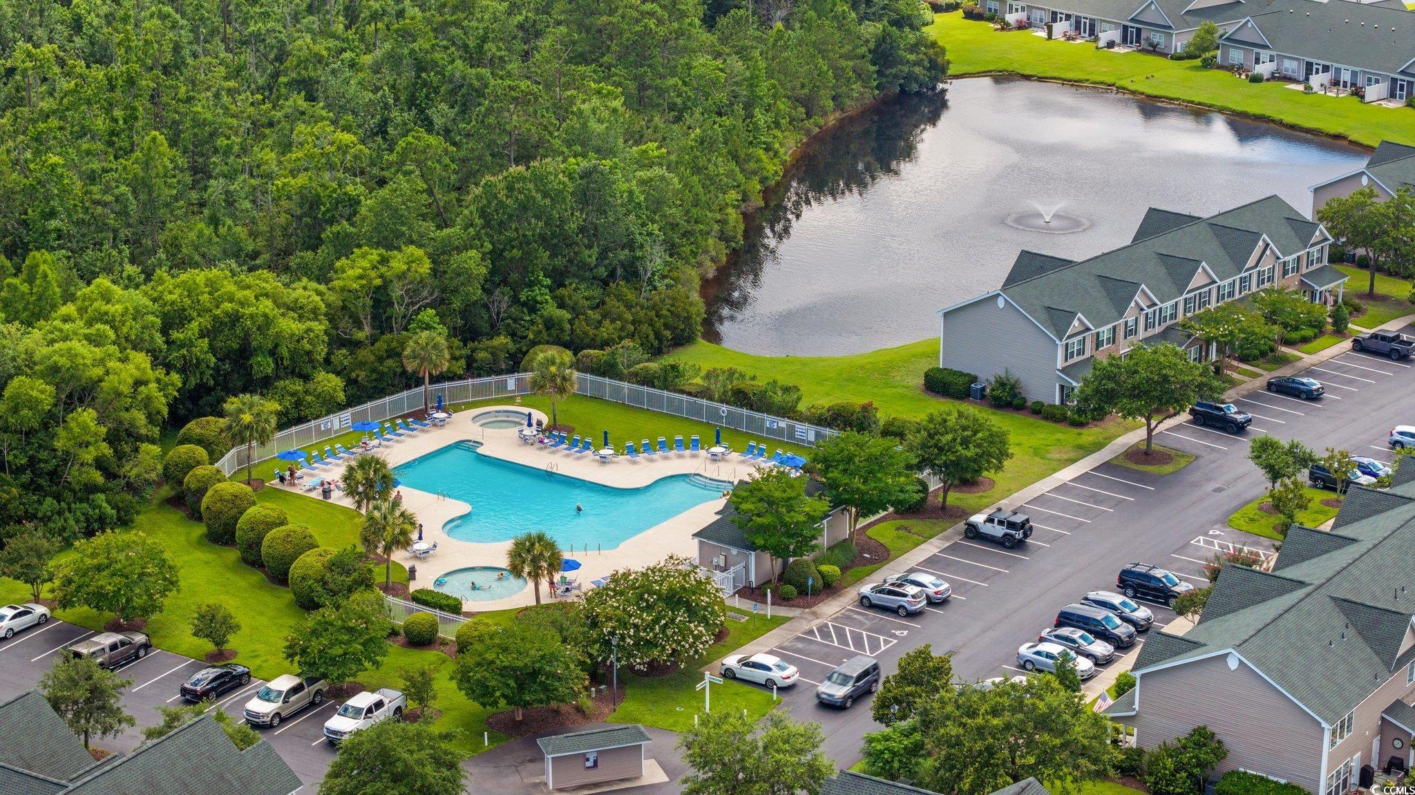 155 Chenoa Drive, Unit D Murrells Inlet, SC 29576 - Photo 29 of 33 Aerial overview of property's location featuring nearby suburban area and a nearby body of water