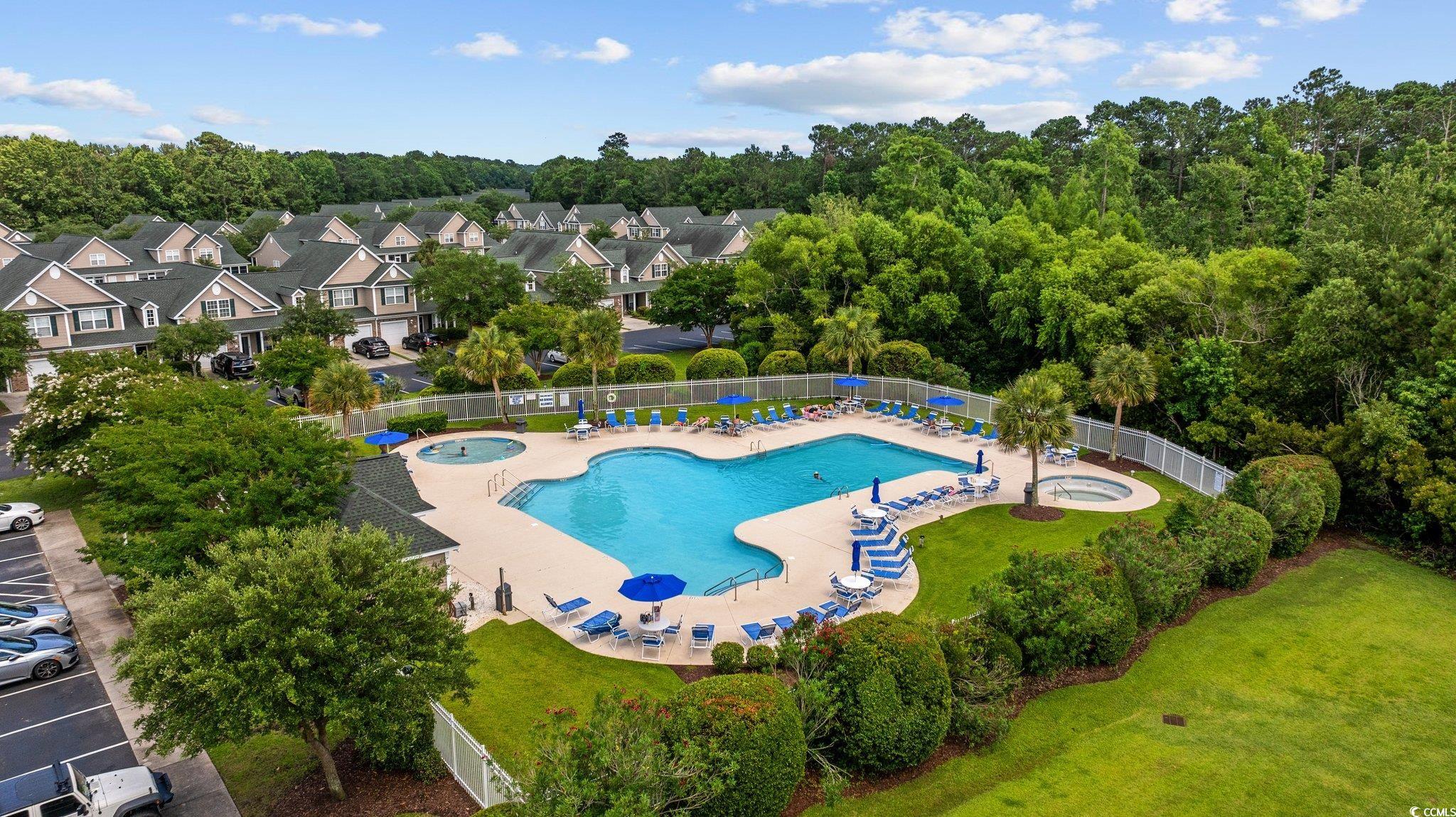 155 Chenoa Drive, Unit D Murrells Inlet, SC 29576 - Photo 30 of 33 Aerial view of residential area with a nearby body of water
