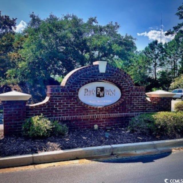 155 Chenoa Drive, Unit D Murrells Inlet, SC 29576 - Photo 31 of 33 Bird's eye view of a pool and a nearby body of water