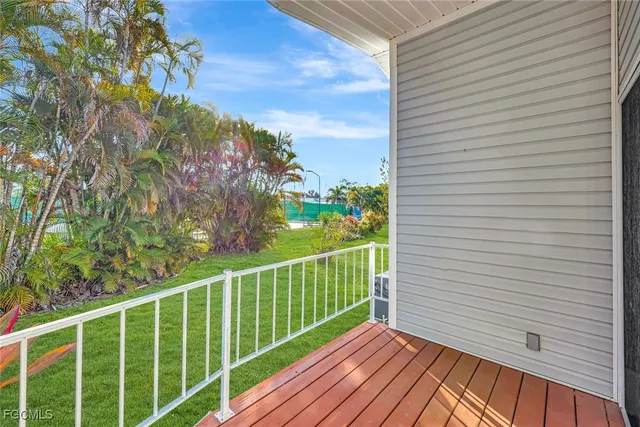 a view of a park with large trees
