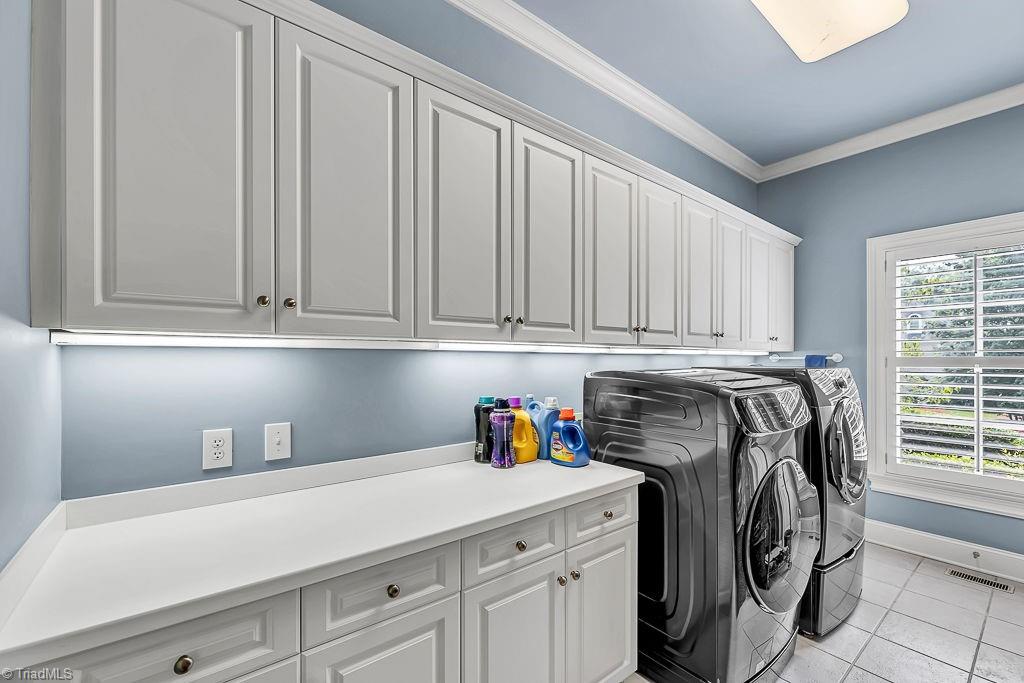 3910 Dover Park Road Greensboro, NC 27407 - Photo 20 of 45 Laundry room features great storage.