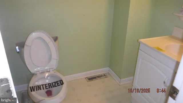 a bathroom with a sink and a toilet