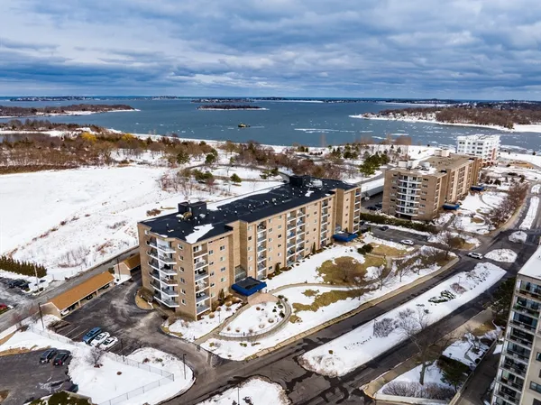 a bathroom with a sink a mirror and shower