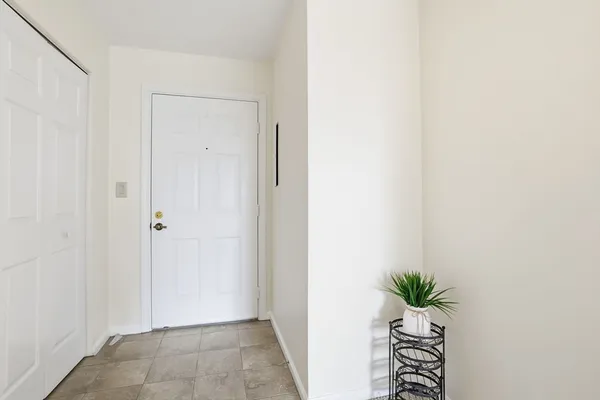 a view of entryway with wooden floor