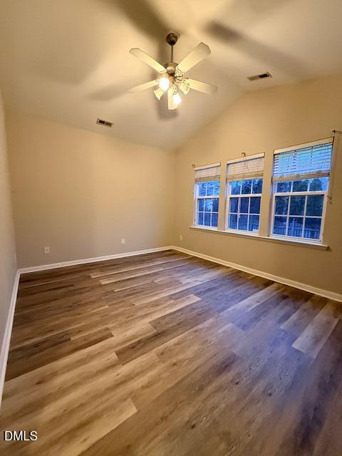 8427 Stone Mason Drive Raleigh, NC 27613 - Photo 11 of 28 wooden floor in an empty room with a window