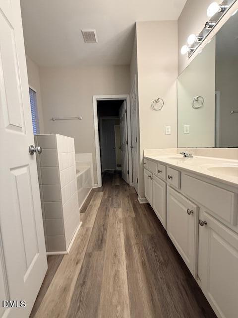 8427 Stone Mason Drive Raleigh, NC 27613 - Photo 12 of 28 a view of a bathroom with sink and mirror