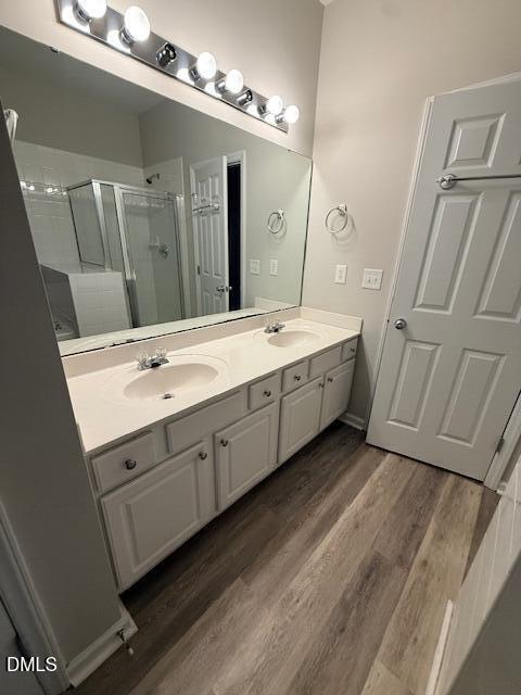 8427 Stone Mason Drive Raleigh, NC 27613 - Photo 14 of 28 a spacious bathroom with a double vanity sink a mirror and a shower