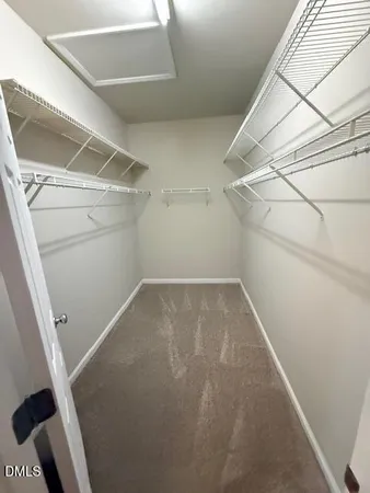 a bathroom with a tub sink and vanity