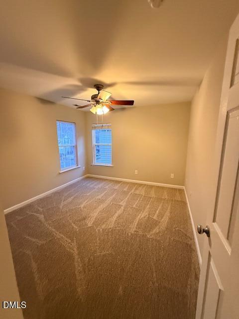 8427 Stone Mason Drive Raleigh, NC 27613 - Photo 21 of 28 a view of a room with a ceiling fan