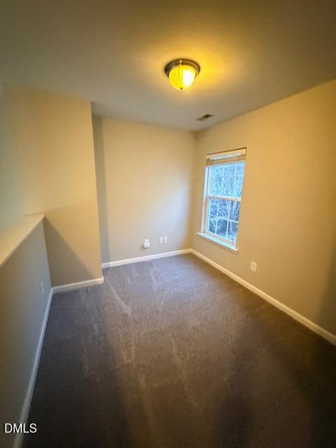 8427 Stone Mason Drive Raleigh, NC 27613 - Photo 24 of 28 an empty room with windows and closet