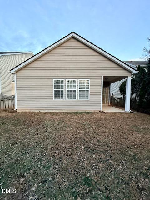 8427 Stone Mason Drive Raleigh, NC 27613 - Photo 27 of 28 a front view of a house with a garden