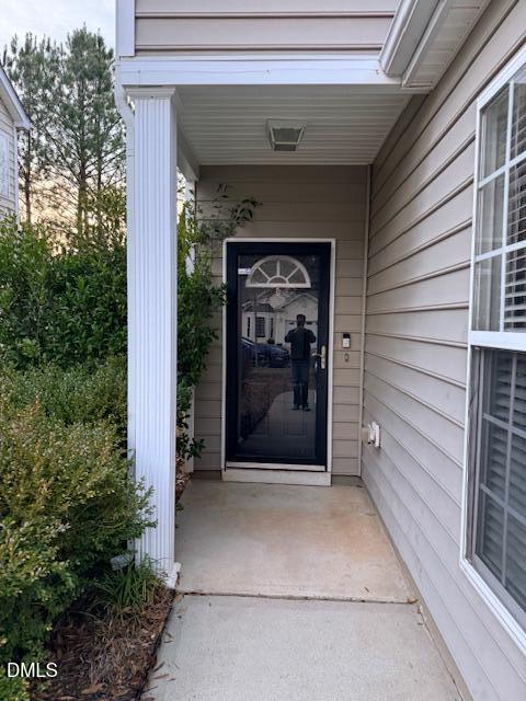 8427 Stone Mason Drive Raleigh, NC 27613 - Photo 4 of 28 a view of a entrance gate of the house