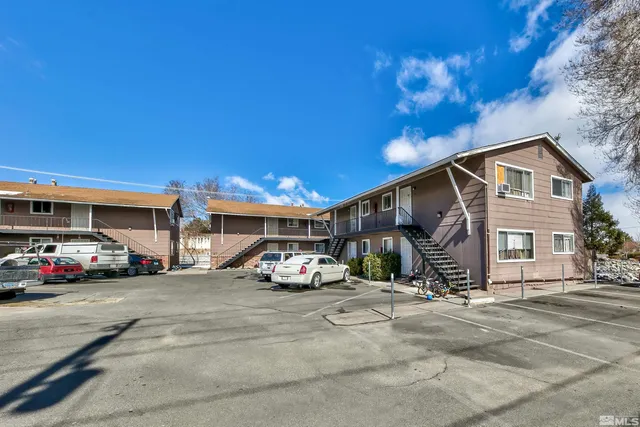 a car parked in front of a building