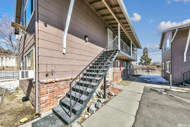 a view of entryway with a front door